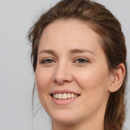 Close-up of a person with a neutral background